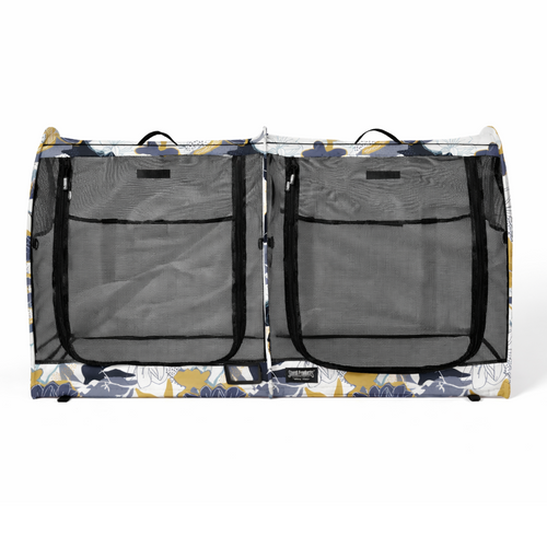 CarGo double pop-up kennel with blue, yellow, and white floral pattern, mesh doors, and black zippers.