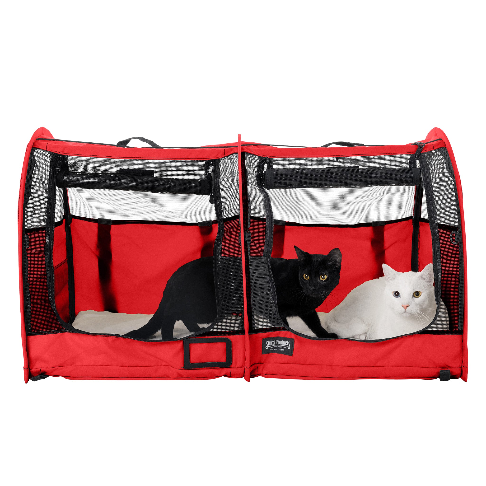 Red CarGo double pop-up kennel with mesh doors, housing a black cat and a white cat.