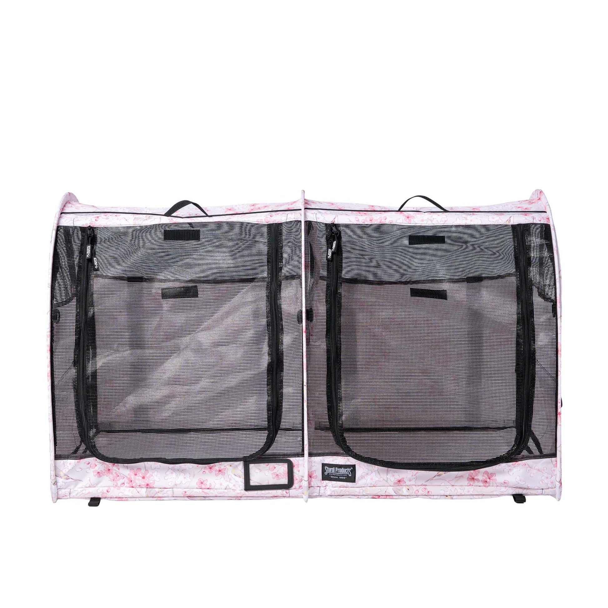 Pink floral CarGo double pop-up pet kennel with black mesh doors and zippers.
