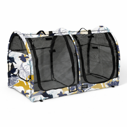 CarGo Double Pop-Up Kennel with blue, yellow, and white floral pattern, mesh doors, and black handles.