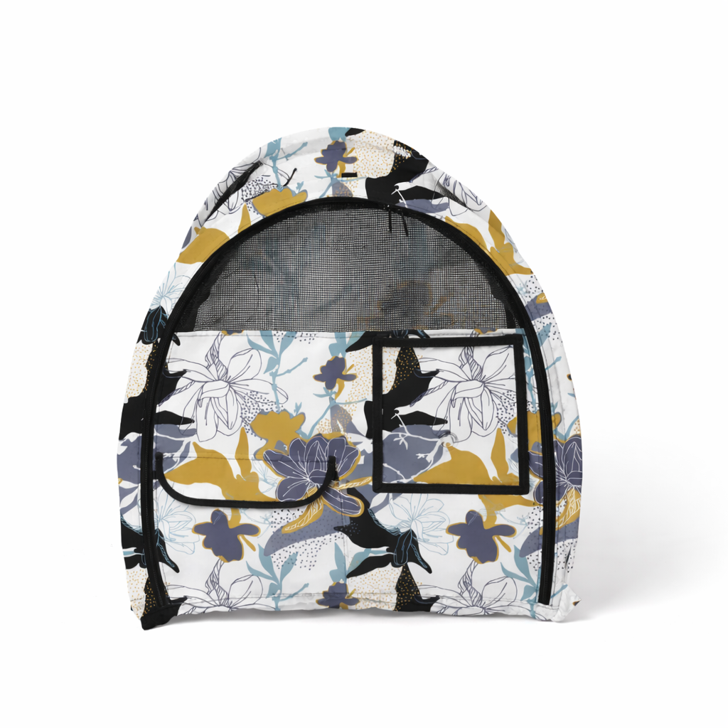White CarGo Pop-Up Kennel with yellow, blue, and black floral pattern, mesh door, and storage pockets.