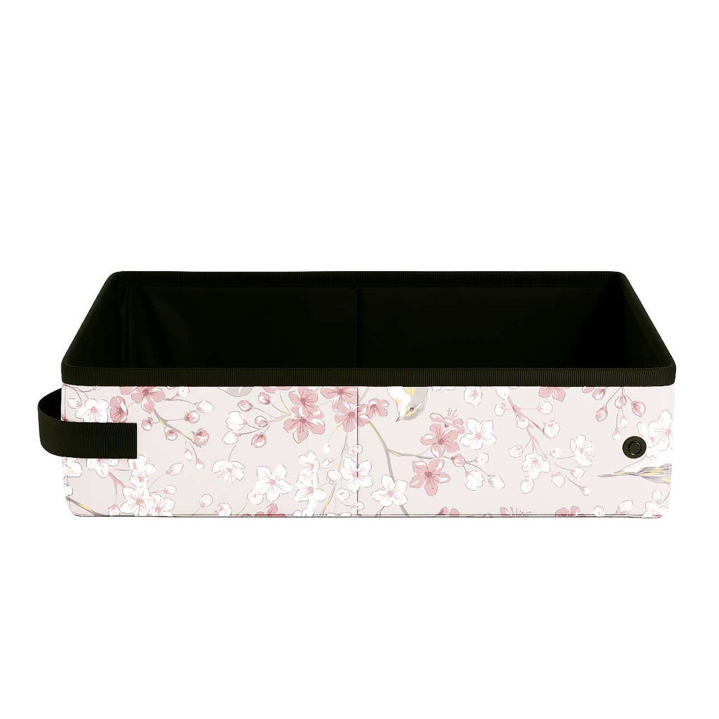 Sakura Nest collapsible storage box with pink cherry blossoms and birds on a light background.