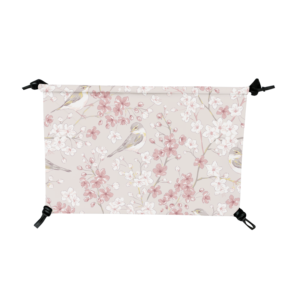 Sakura Nest Hammock Cover with pink and white cherry blossoms and small birds on a light tan background.