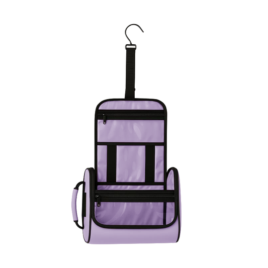 Lavender hanging pet toiletry organizer with clear vinyl pockets, black zippers, and a hook.