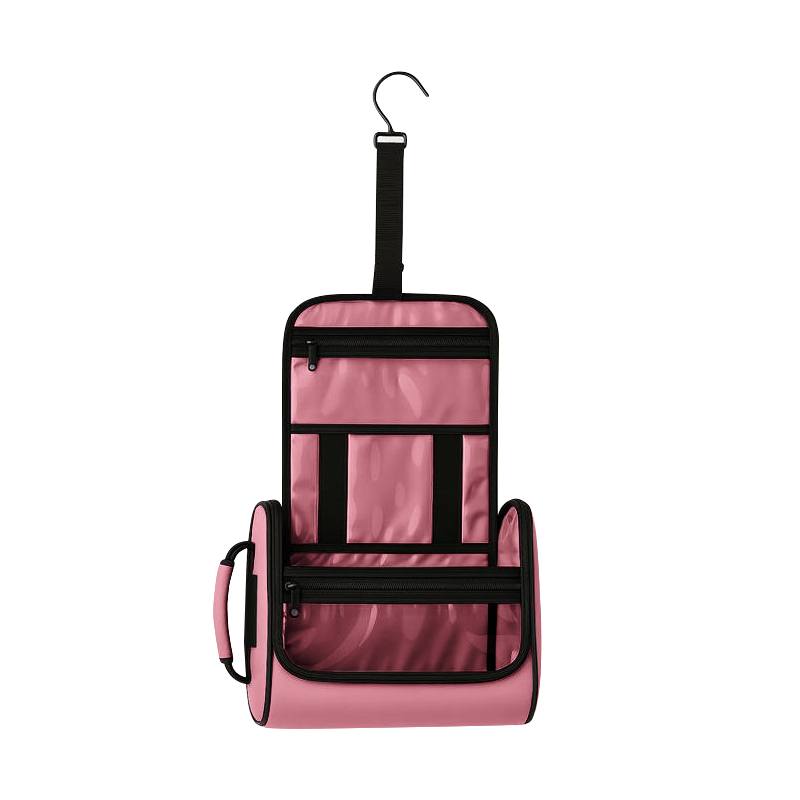 Pink hanging pet toiletry organizer with black zippers, clear vinyl pockets, and a top hook.