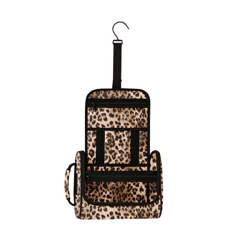 Leopard print hanging pet toiletry organizer with black trim, hook, handle, and multiple zippered compartments.