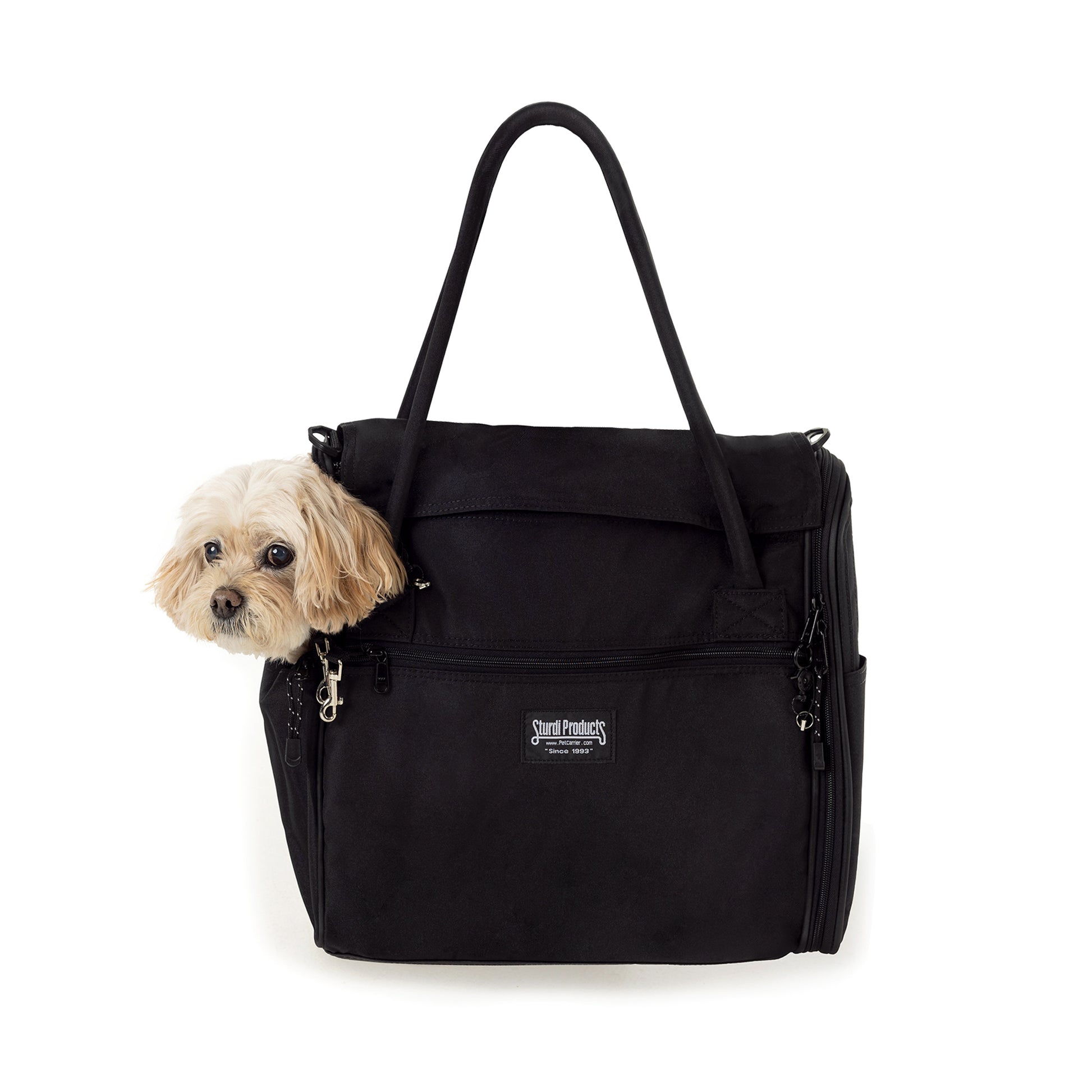 Black Incognito pet travel tote with a small dog peeking out, featuring a shoulder strap and Sturdi Products logo.