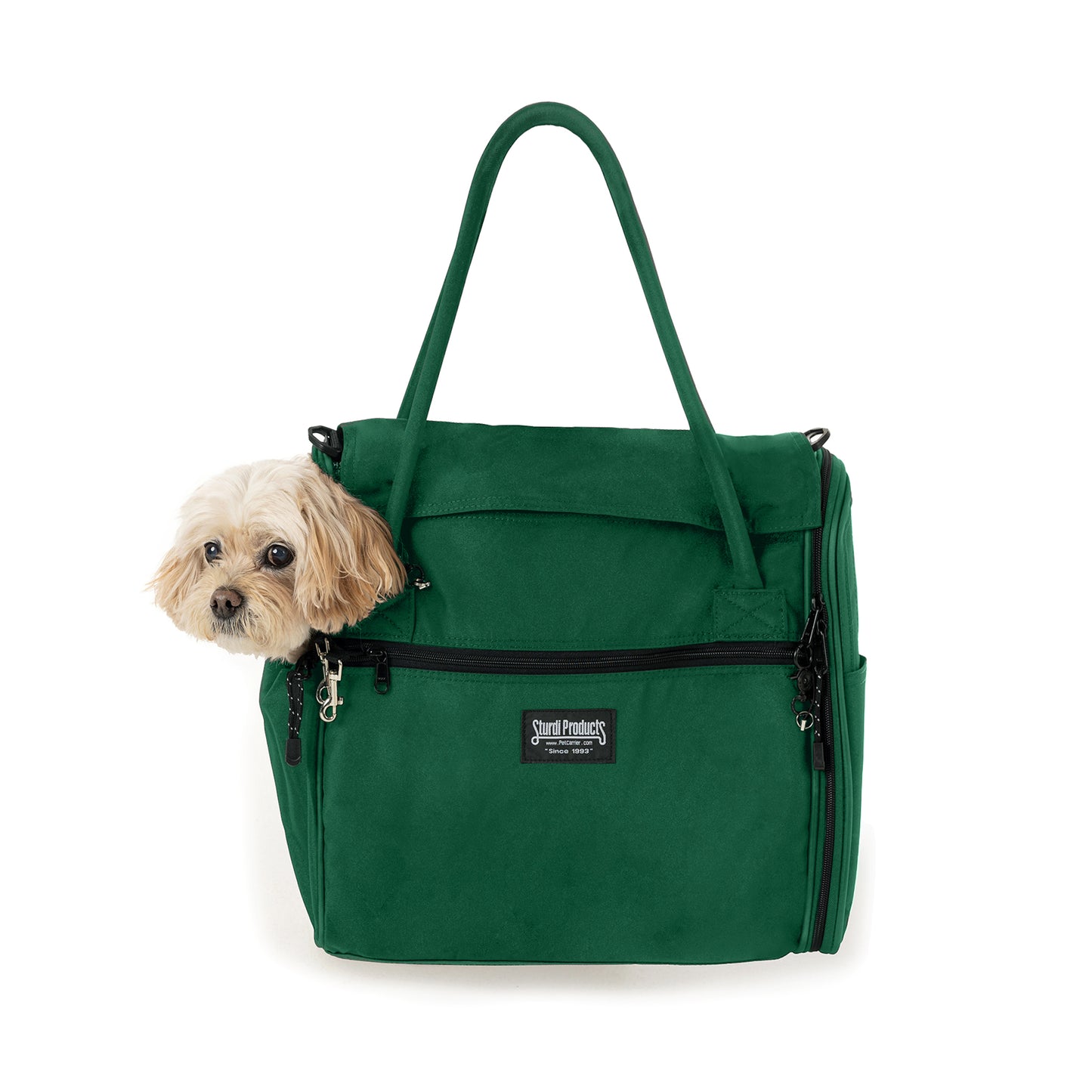 Green Incognito discreet pet travel tote with a small dog peeking out, featuring black zippers and a shoulder strap.