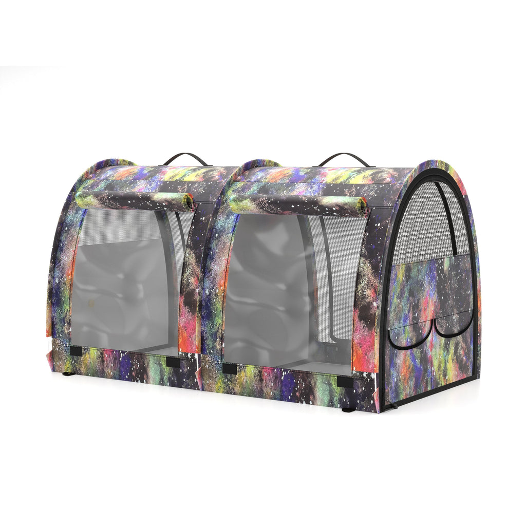Double pop-up pet kennel in a colorful galaxy print with mesh windows and black trim.
