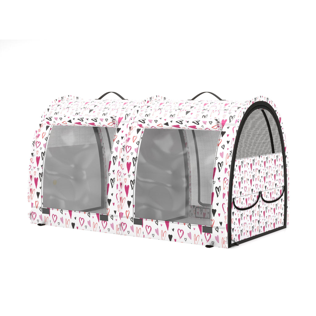 White double pop-up pet kennel with pink and black heart print, mesh windows, and black trim.