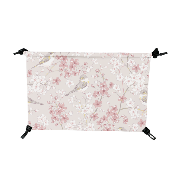 Beige microfiber pet hammock cover with pink cherry blossoms and small birds, featuring black adjustable cords.