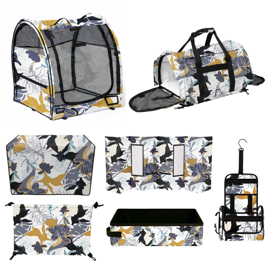 Midnight Bloom pet travel bundle: carrier, kennel, grooming station, skirt, toiletry bag, box, hammock, shelter pad, and drape with floral design.