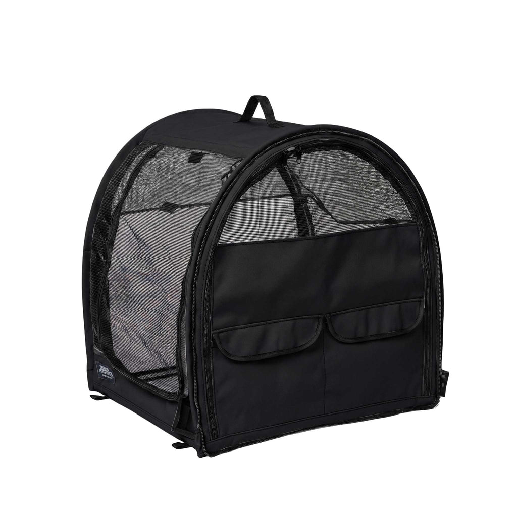 Black modular pop-up pet kennel with mesh sides, front storage pockets, and a top handle.