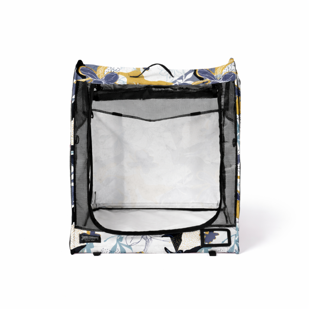 Colorful modular pop-up pet kennel with floral pattern, mesh door, and black trim.