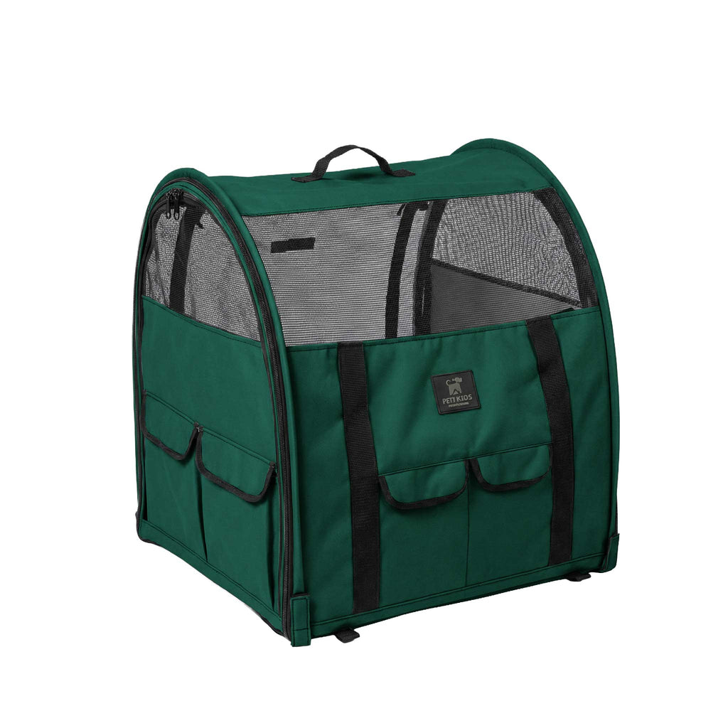Dark green modular pop-up pet kennel with mesh windows, multiple storage pockets, and a top handle.
