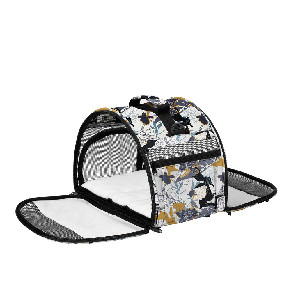 Floral Totes'ter compact pet carrier with mesh panels, top flap, and soft white interior pad.
