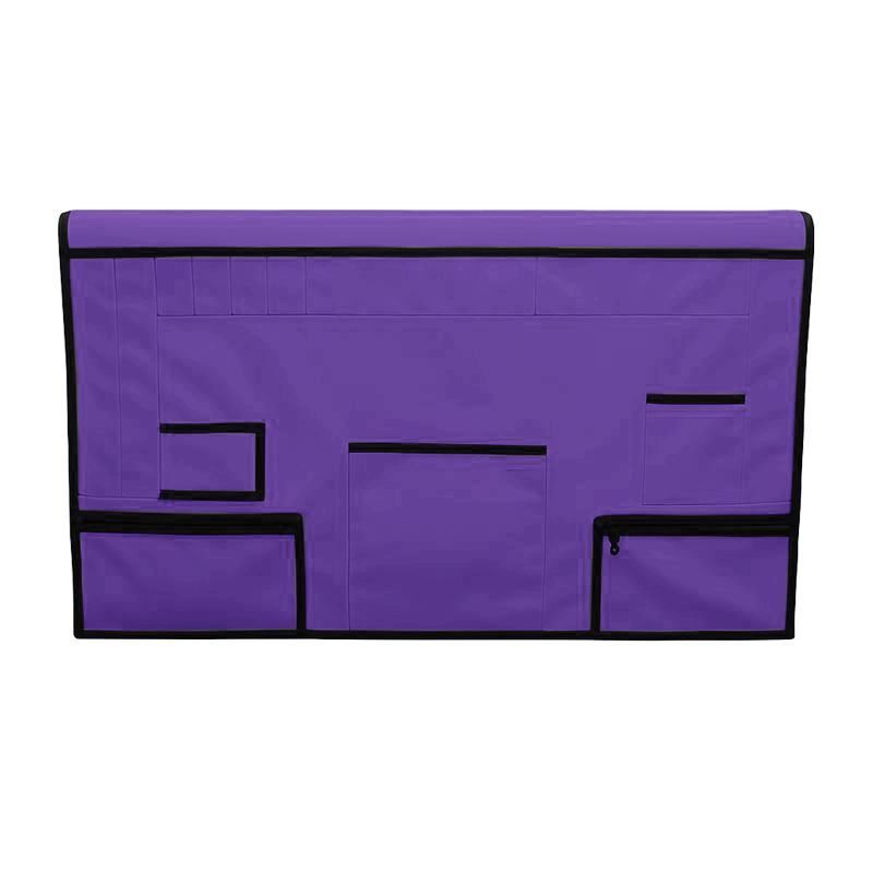Purple pet grooming table skirt with multiple black-trimmed pockets and zippered pouches.