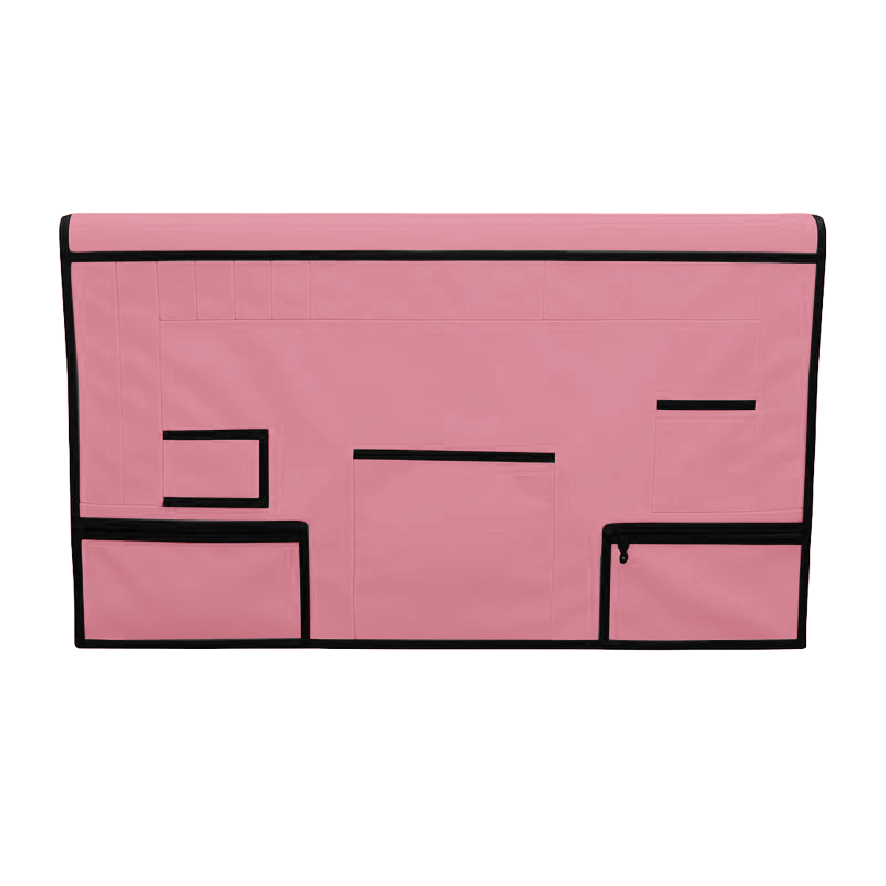 Pink pet grooming table skirt with black trim, multiple pockets, and zippered pouches.