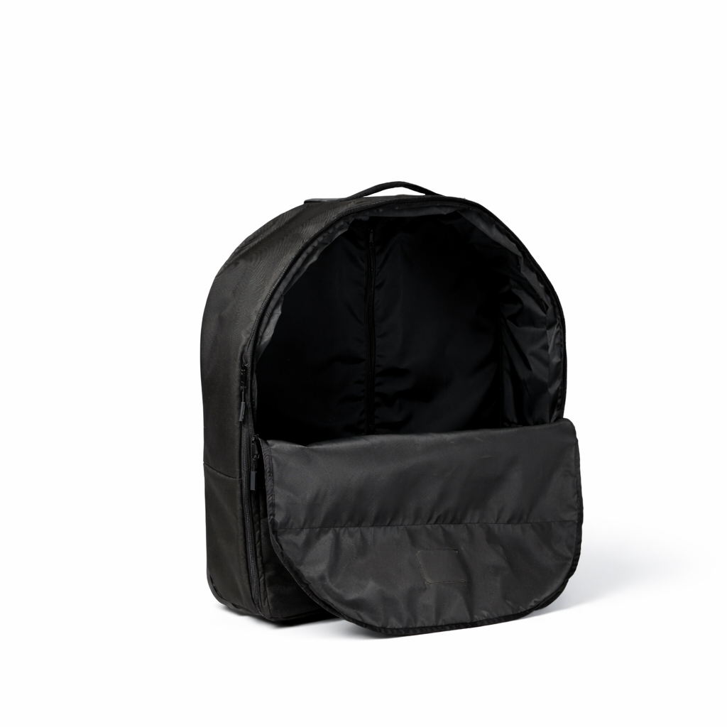 Black polyester rolling pop-up kennel luggage bag, open to show the spacious interior.