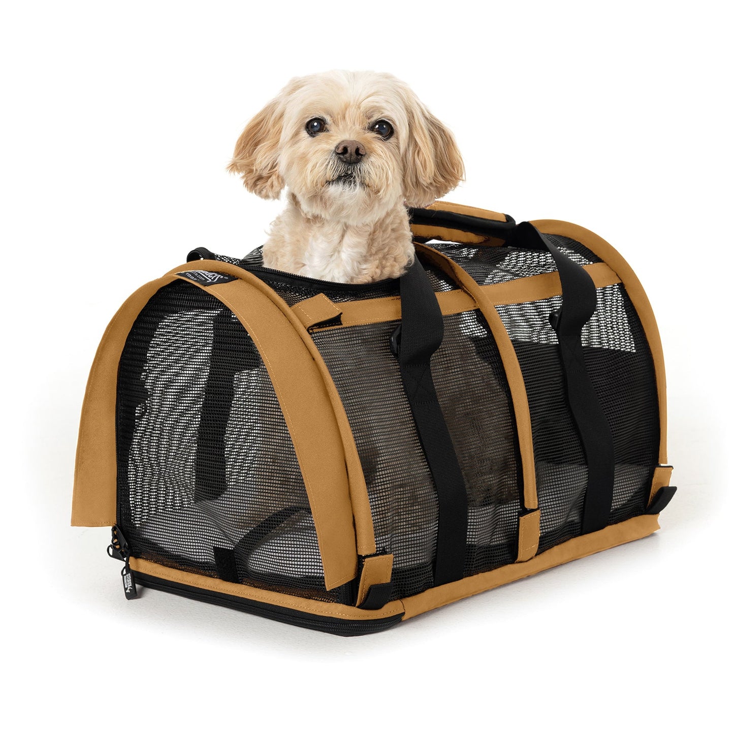 Tan and black SturdiBag All Mesh Pet Carrier with a small dog peeking out the top.
