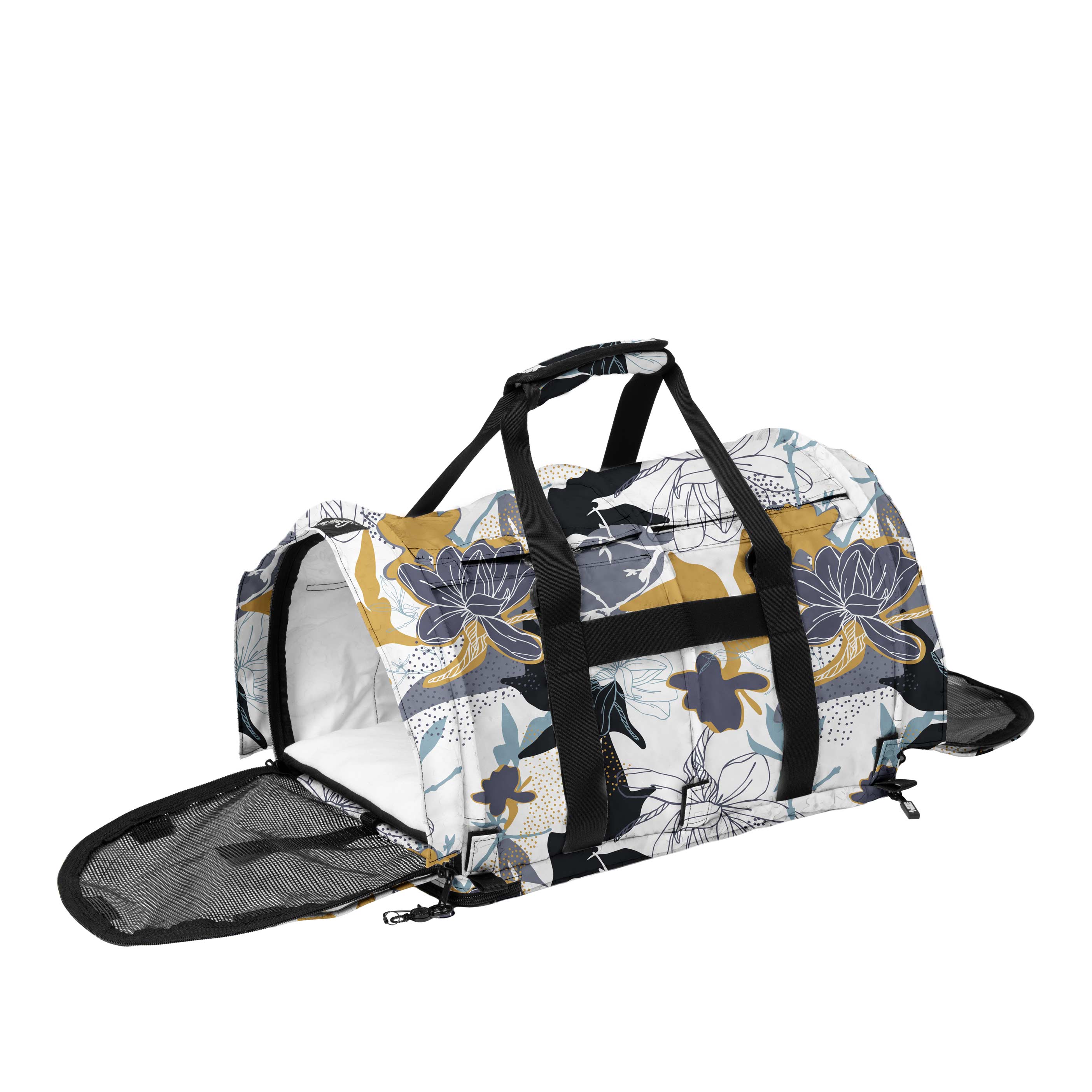 SturdiBag Pro 3.0 soft-sided pet carrier with a white, blue, and gold floral pattern, mesh panels, and black straps.