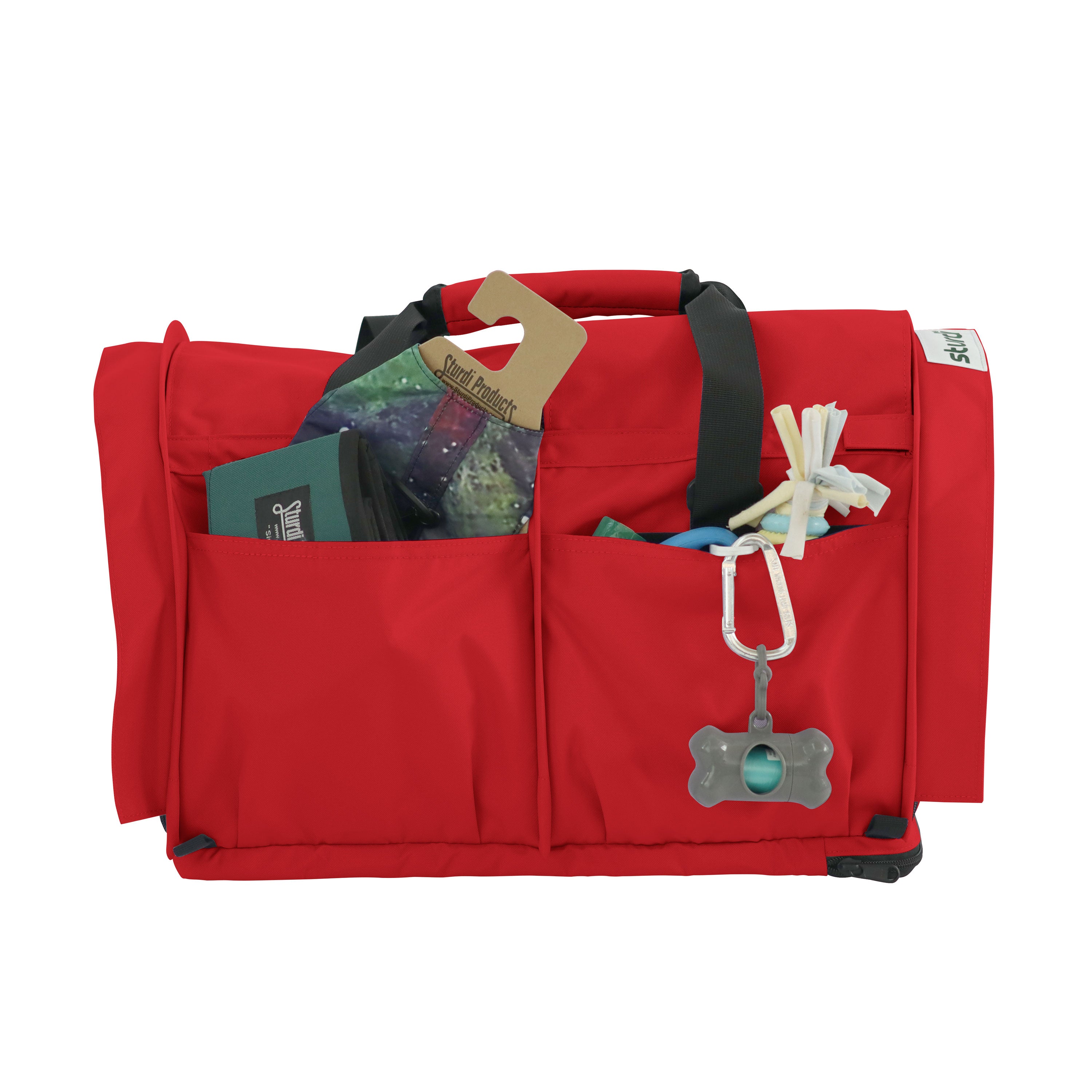 Red SturdiBag Pro 3.0 pet carrier with mesh pockets holding pet essentials and a bone-shaped dispenser.