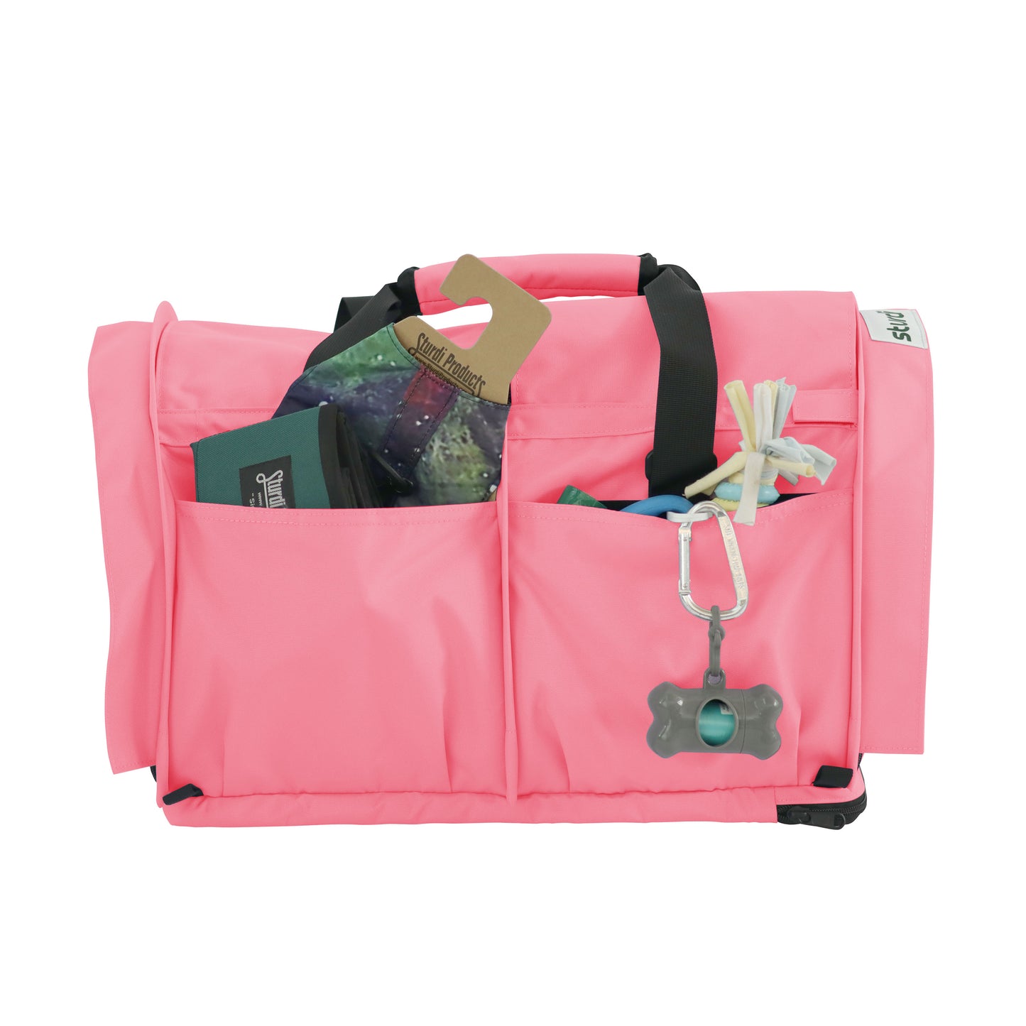 Pink SturdiBag Pro 3.0 soft-sided pet carrier with mesh, pockets, and travel essentials.