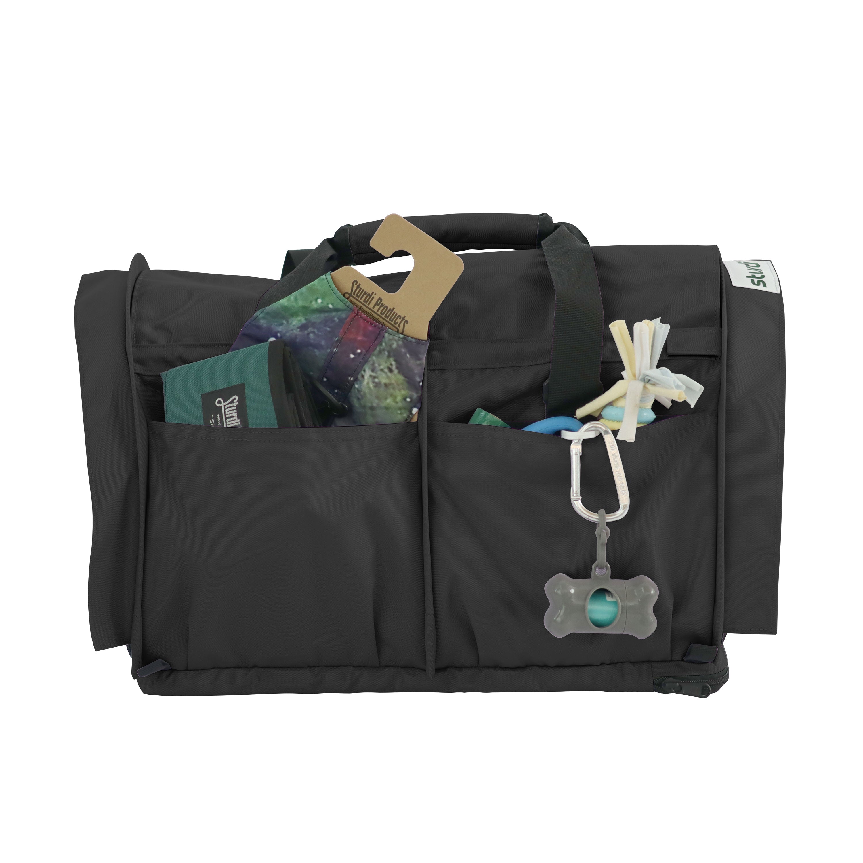 Black SturdiBag Pro 3.0 pet carrier with front pockets holding pet essentials and a bone-shaped dispenser.