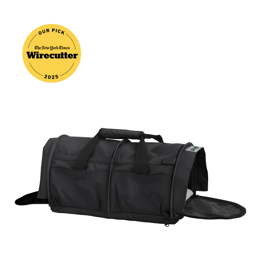 Black SturdiBag Pro 3.0 soft-sided pet carrier with mesh window, handles, and shoulder strap.