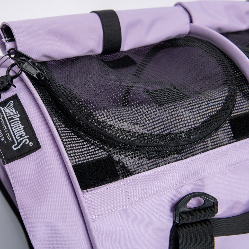 Light purple SturdiBag Pro 3.0 pet carrier with black mesh top, zipper, and straps.