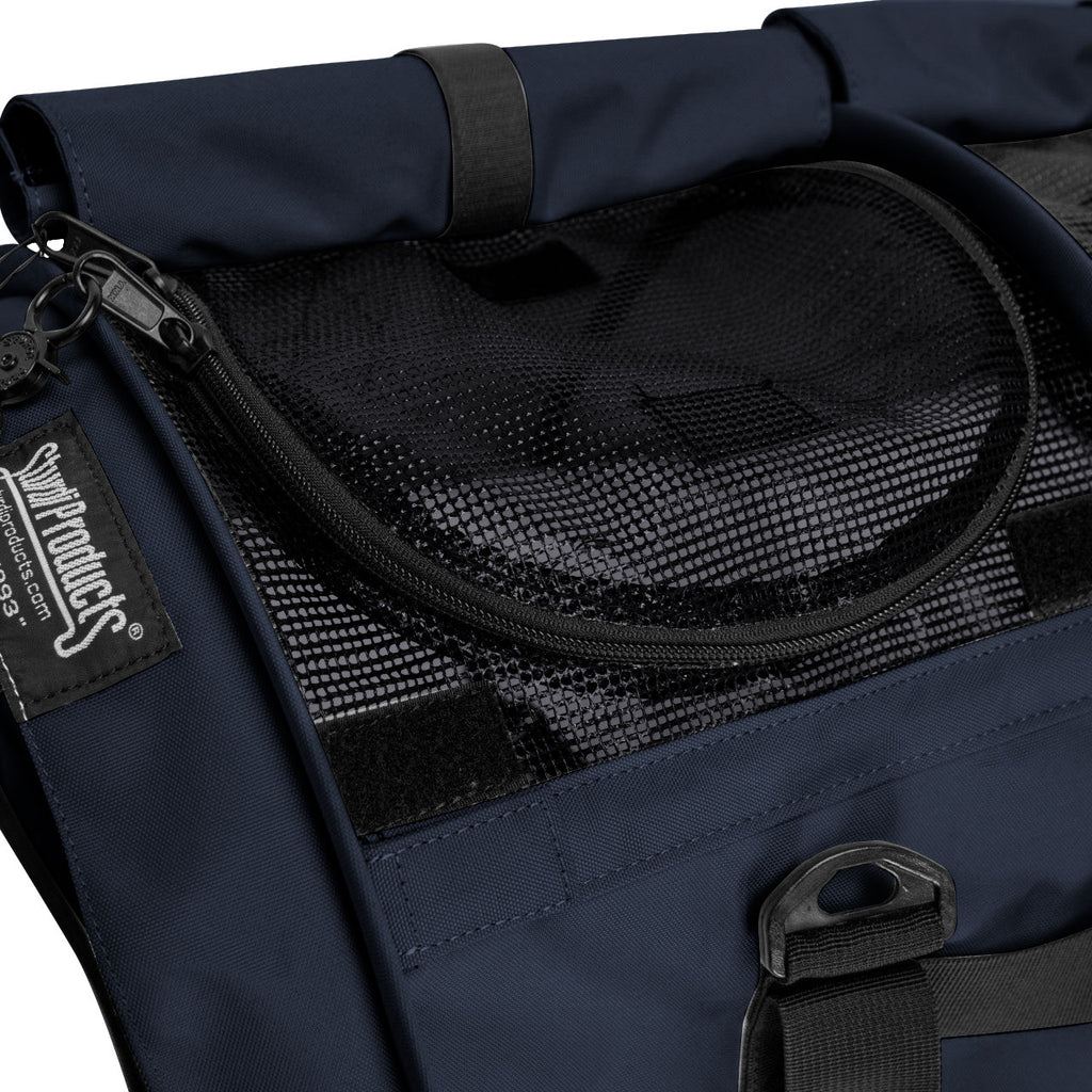 Close-up of a navy blue SturdiBag Pro 3.0 pet carrier with black mesh window and zipper.