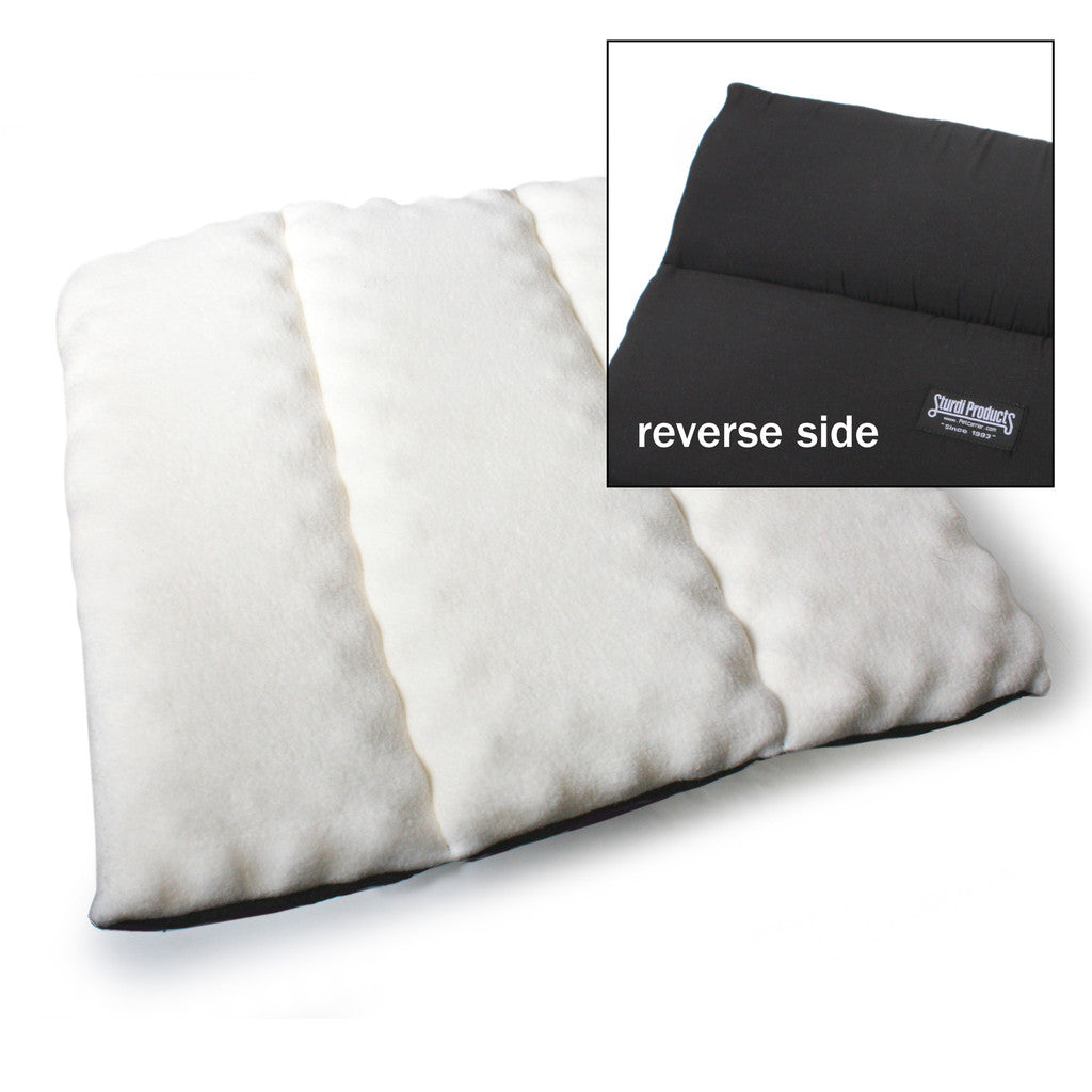 Cream fleece pet comfort pad with black reverse side, quilted for pop-up kennels.