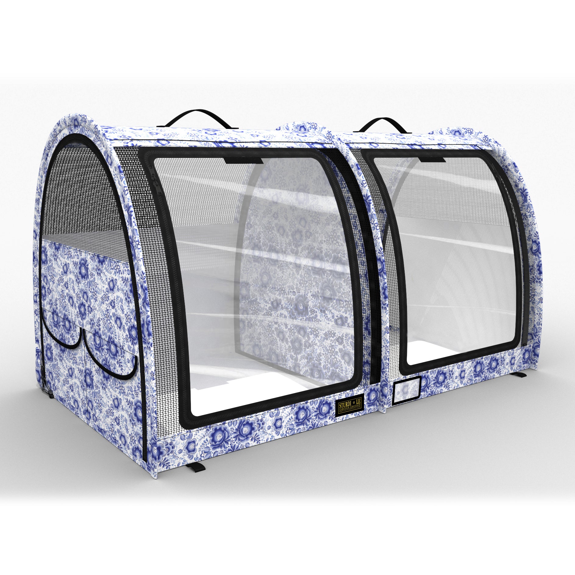 Blue and white floral double pop-up pet kennel with mesh doors, black trim, and carrying handles.